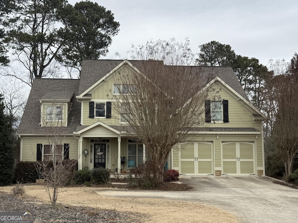 view of front of home with a garage