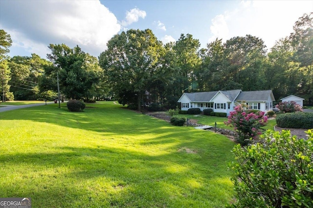 exterior space with a front yard