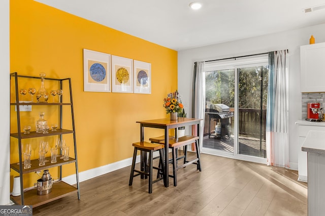 dining room featuring hardwood / wood-style floors