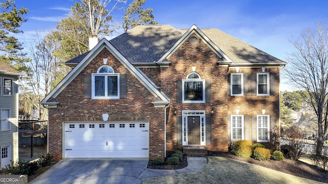 view of front of home with a garage