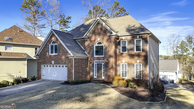 view of front of property with a garage