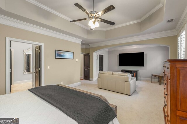 bathroom with tile patterned floors, crown molding, a shower with shower door, and vanity