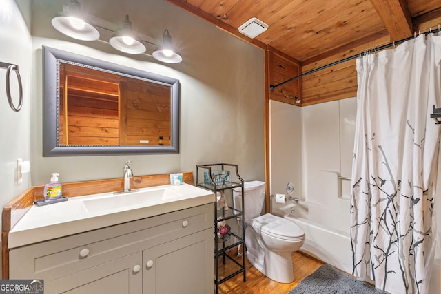 full bathroom with toilet, hardwood / wood-style flooring, wooden ceiling, shower / bath combo with shower curtain, and vanity