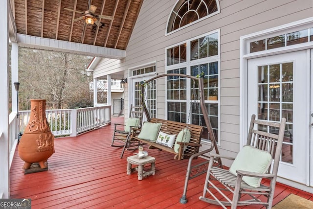 wooden deck with ceiling fan