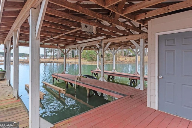 dock area with a water view