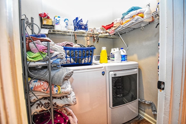 laundry room featuring washer and clothes dryer