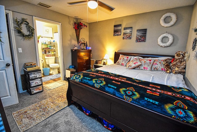 bedroom with ceiling fan and connected bathroom