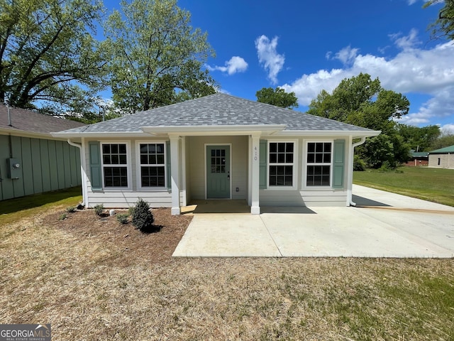 410 Hardy Ave SW, Rome, GA 30161 - view of front of house featuring roof with shingles and a front lawn