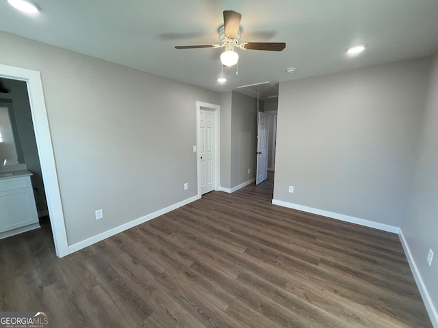 410 Hardy Ave SW, Rome, GA 30161 - unfurnished bedroom featuring baseboards, dark wood-style flooring, ceiling fan, recessed lighting, and attic access