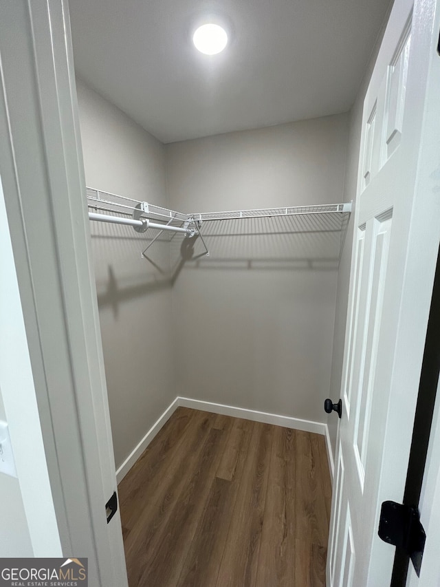 410 Hardy Ave SW, Rome, GA 30161 - walk in closet featuring wood finished floors