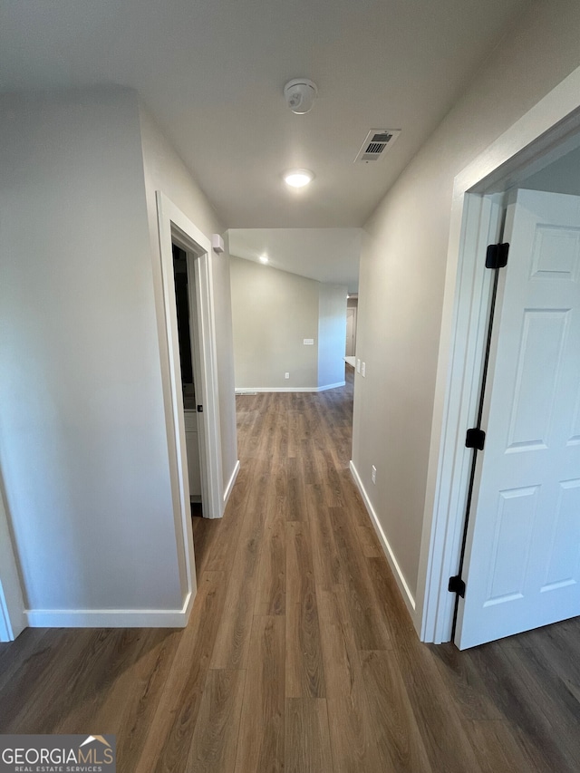410 Hardy Ave SW, Rome, GA 30161 - hall featuring visible vents, baseboards, and dark wood finished floors