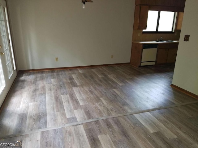 interior space featuring sink and light hardwood / wood-style flooring