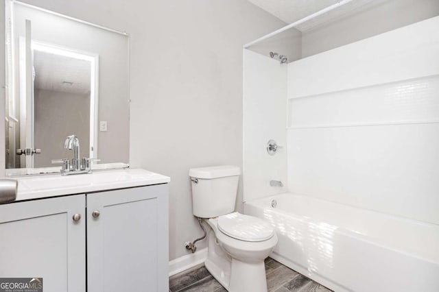 full bathroom featuring toilet, shower / bathtub combination, and vanity