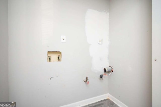 washroom with washer hookup and gas dryer hookup