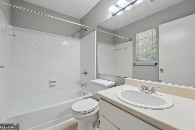 full bathroom featuring toilet, vanity, and shower / washtub combination