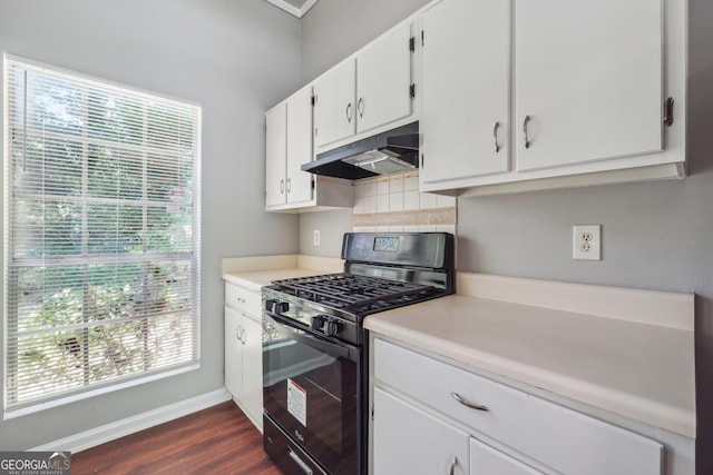 kitchen with dark wood-type flooring, gas stove, and white cabinets