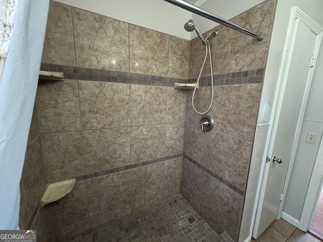 bathroom with a shower with curtain