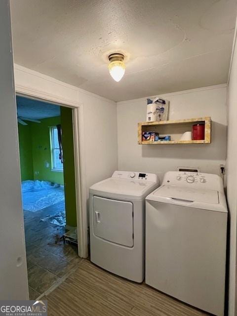 laundry room with independent washer and dryer