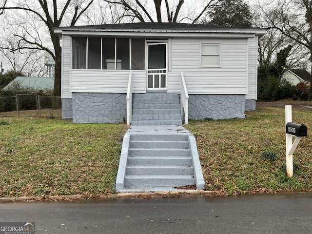 view of front of house with a front yard