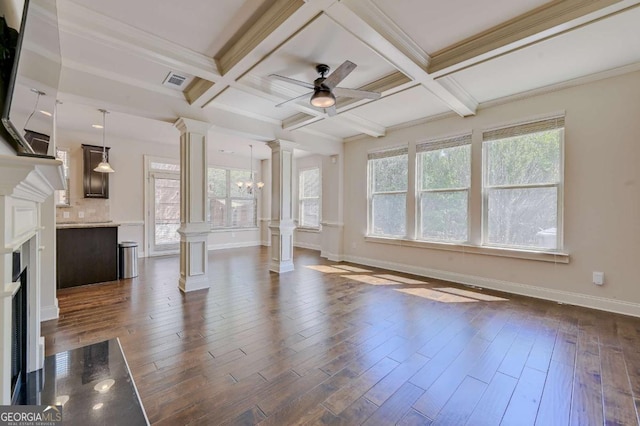 unfurnished living room featuring dark hardwood / wood-style flooring, beamed ceiling, and coffered ceiling