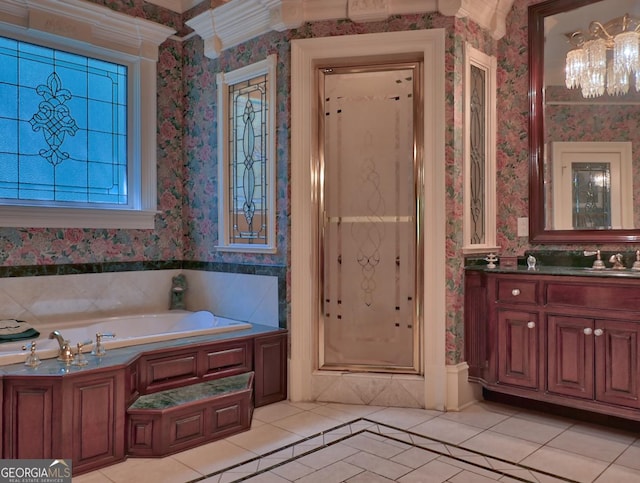 bathroom featuring an enclosed shower, vanity, and tile patterned flooring