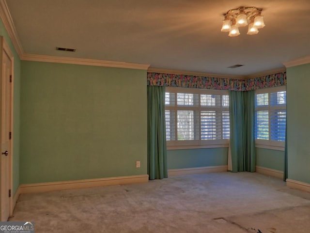 empty room with carpet and ornamental molding