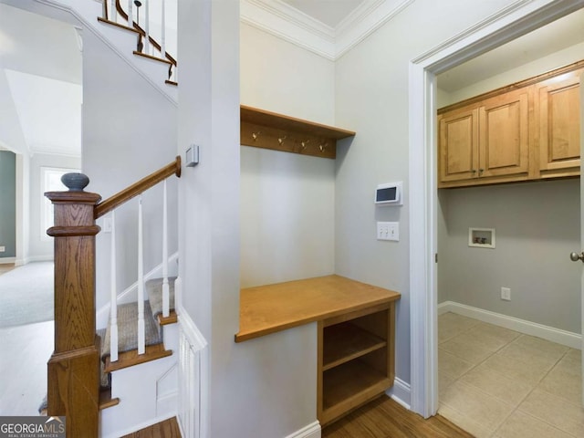 mudroom with crown molding