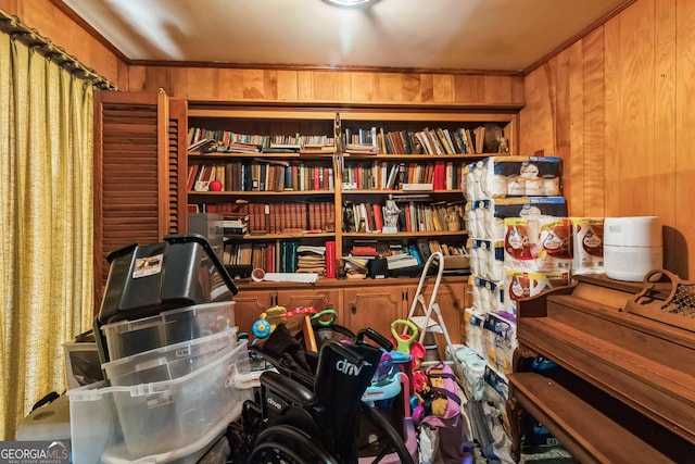 interior space featuring wood walls