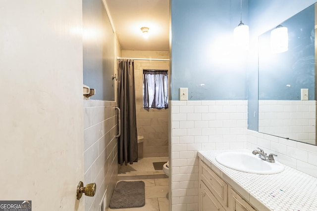 bathroom featuring tile walls, toilet, vanity, and a shower with curtain