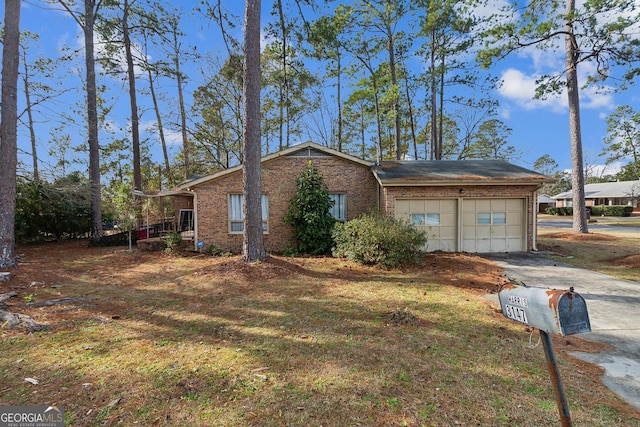 ranch-style home featuring a garage