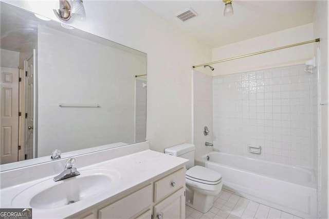 full bathroom featuring toilet, vanity, and shower / washtub combination