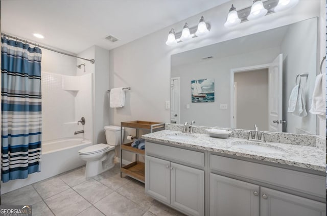 full bathroom with tile patterned flooring, toilet, vanity, and shower / bath combination with curtain