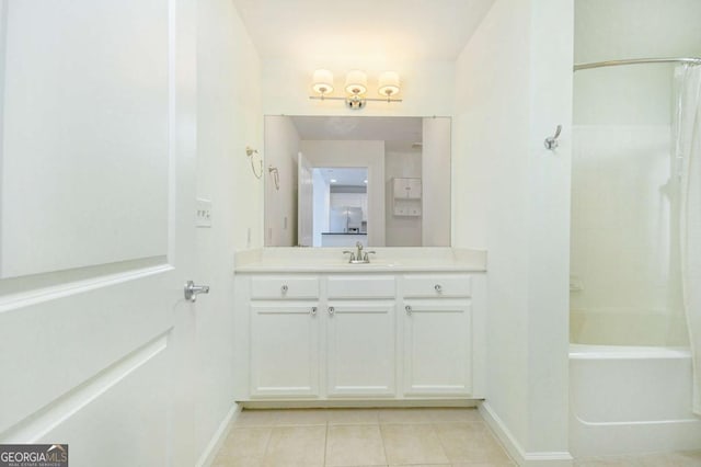 bathroom with vanity, tile patterned flooring, and shower / bath combination with curtain