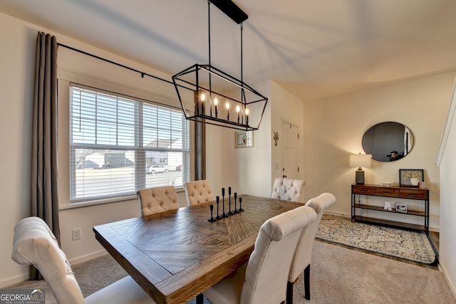 dining space with carpet