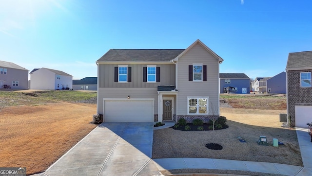 view of front of property with a garage