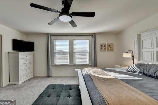 bedroom with light carpet and ceiling fan