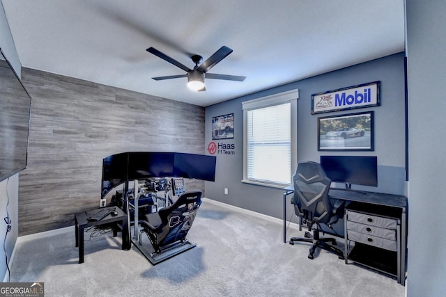 office space with ceiling fan and carpet