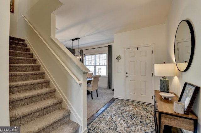 foyer featuring carpet floors