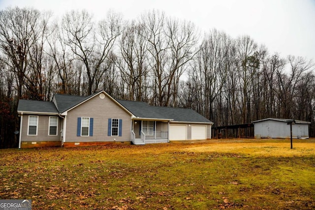 ranch-style house featuring a garage