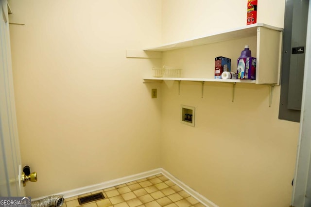 laundry area featuring tile patterned floors and hookup for a washing machine