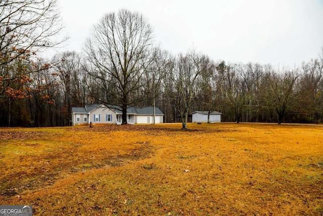 view of yard featuring a garage