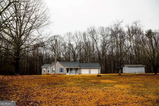 ranch-style house featuring a shed