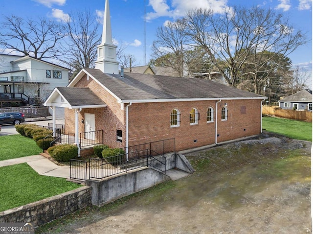 back of house with a yard