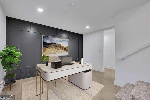 office space featuring light hardwood / wood-style floors