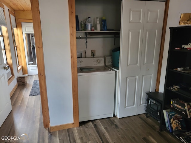 laundry room featuring dark hardwood / wood-style flooring and washer / clothes dryer