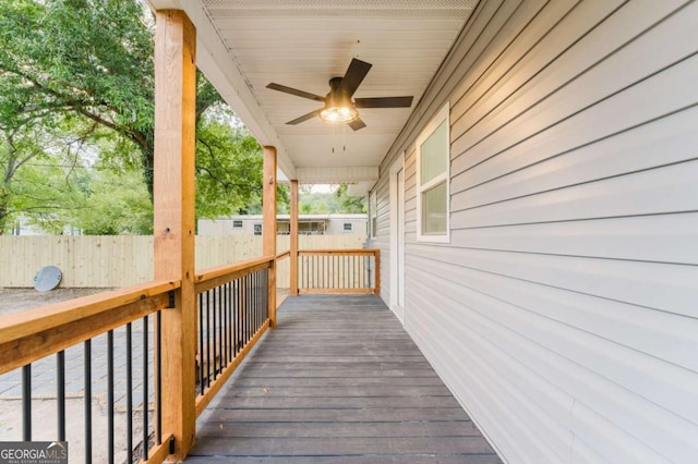 wooden terrace with ceiling fan