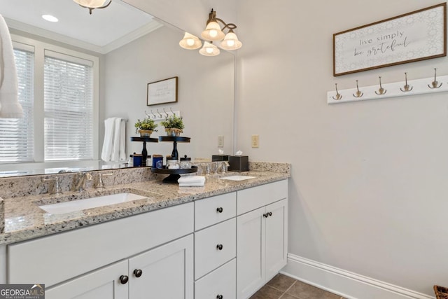 bathroom featuring vanity, ornamental molding, and tile patterned flooring