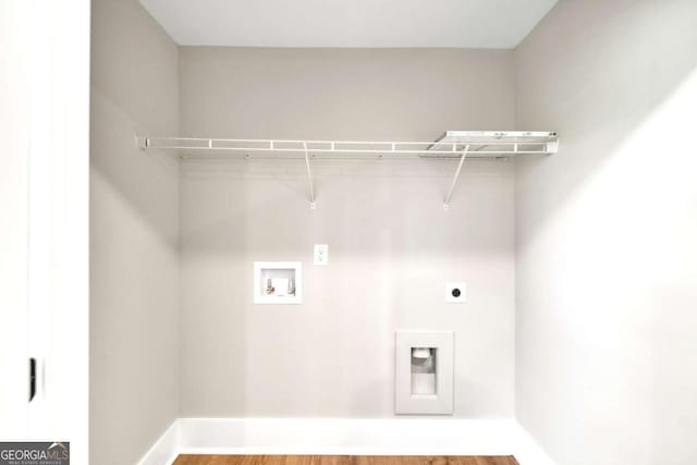 laundry room featuring hardwood / wood-style flooring, hookup for a washing machine, and hookup for an electric dryer