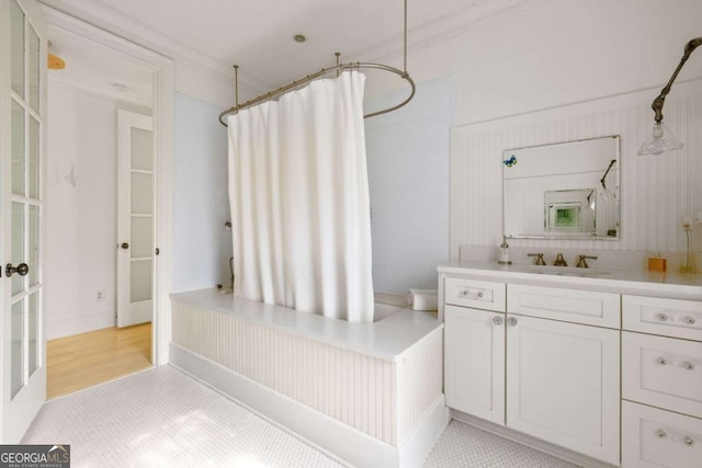 bathroom with vanity, ornamental molding, and shower / bath combination with curtain