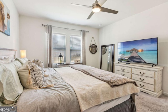 carpeted bedroom featuring ceiling fan